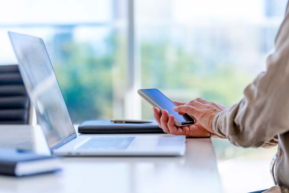 Person sitting in front of a computer.